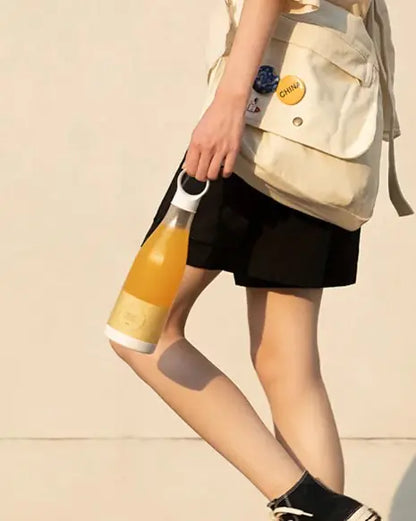 Mini Hand-held Juice Extractor